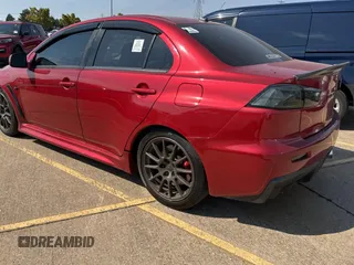 2012 Mitsubishi Lancer Evolution GSR z VIN JA32W8FV0CU019216, wystawiony jako Copart lot #75898944 z przebiegiem 129 387 mil mil oraz Tytuł czysty. Historia ofert i sprzedaży dostępna na DreamBid. Obrazek 3.