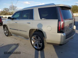 2015 Cadillac Escalade z VIN 1GYS4AKJ1FR100437, wystawiony jako Copart lot #78578004 z przebiegiem 51 574 mil mil oraz Czysty tytuł • Clean title. Historia ofert i sprzedaży dostępna na DreamBid. Obrazek 2.