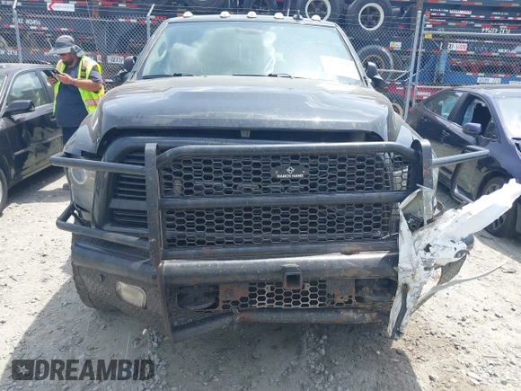 2018 Ram 2500 Laramie with VIN 3C6UR5NLXJG256688, listed as a IAAI auction lot 42168537 with 214,596 mi miles and . Bid and sale history available at DreamBid. Image 12.
