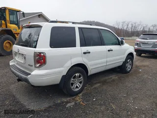2004 Honda Pilot EX with VIN 2HKYF185X4H571558, listed as a IAAI auction lot 41901839 with 196,703 mi miles. Bid and sale history available at carsss.com. Image 4.