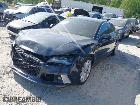2012 Audi A7 Prestige with VIN WAUSGAFC0CN008552, listed as a IAAI auction lot 42068614 with 107,400 mi miles and . Bid and sale history available at DreamBid. Image 2.