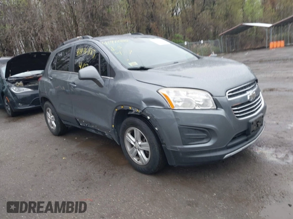 2015 Chevrolet Trax LT with VIN KL7CJRSBXFB097960, listed as a IAAI auction lot 41976883 with 98,621 mi miles and . Bid and sale history available at carsss.com. Image 1.