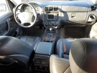 2005 Mercedes-Benz M 500 z VIN 4JGAB75E05A557161, wystawiony jako Copart lot #89368305 z przebiegiem 185 929 mil mil oraz Czysty tytuł • Clean title. Historia ofert i sprzedaży dostępna na DreamBid. Obrazek 8.