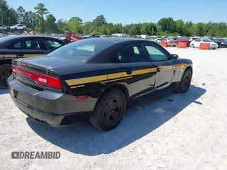 2014 Dodge Charger Police with VIN 2C3CDXAT3EH186045, listed as a IAAI auction lot 42136164 with 151,761 mi miles and . Bid and sale history available at carsss.com. Image 4.