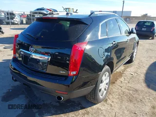 2016 Cadillac SRX Luxury Collection with VIN 3GYFNEE39GS583306, listed as a IAAI auction lot 41312161 with 98,831 mi miles. Bid and sale history available at carsss.com. Image 4.