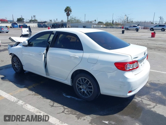 2013 Toyota Corolla L with VIN JTDBU4EE1DJ116557, listed as a IAAI auction lot 41981691 with 169,898 mi miles. Bid and sale history available at carsss.com. Image 3.