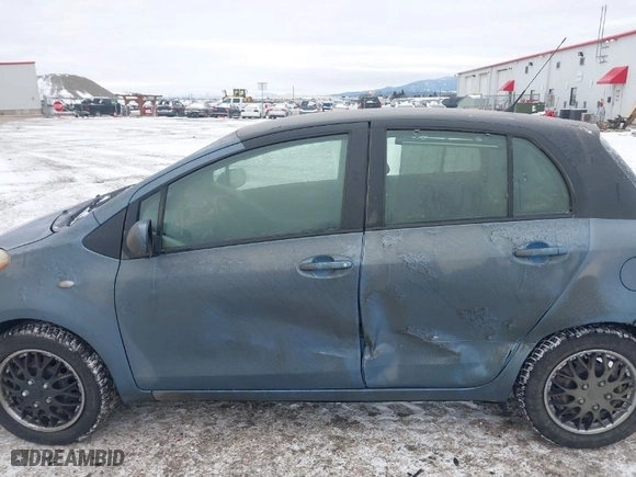 2010 Toyota Yaris with VIN JTDKT4K30A5321944, listed as a IAAI auction lot 41505259 with 140,929 mi miles. Bid and sale history available at carsss.com. Image 14.
