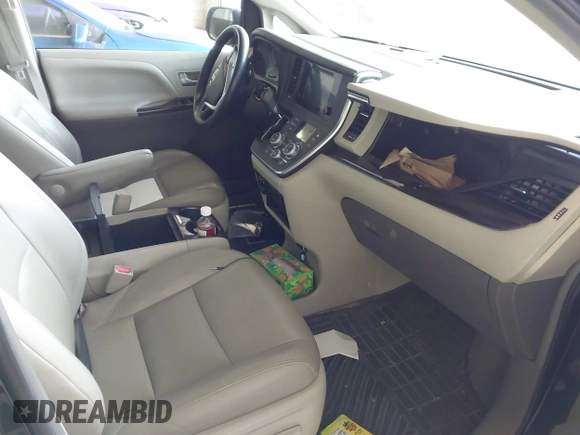 2015 Toyota Sienna Limited with VIN 5TDDK3DC9FS104493, listed as a IAAI auction lot 42055937 with 126,728 mi miles and . Bid and sale history available at DreamBid. Image 5.