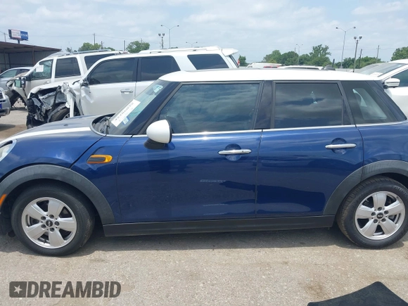 2017 MINI Hardtop 4 Door Cooper with VIN WMWXU1C59H2E18069, listed as a IAAI auction lot 42286035 with 85,835 mi miles and . Bid and sale history available at DreamBid. Image 14.