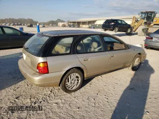 1998 Saturn SW z VIN 1G8ZK8279WZ246084, wystawiony jako Copart lot #77267514 z przebiegiem 143 224 mil mil oraz Tytuł czysty. Historia ofert i sprzedaży dostępna na DreamBid. Obrazek 3.