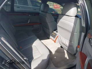 2006 Volkswagen Phaeton z VIN WVWAF03D168000214, wystawiony jako IAAI lot #41935384 z przebiegiem 80 641 mil mil oraz . Historia ofert i sprzedaży dostępna na DreamBid. Obrazek 8.