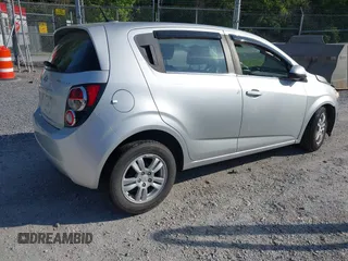 2012 Chevrolet Sonic LT with VIN 1G1JC6SH5C4167574, listed as a IAAI auction lot 42133100 with 59,473 mi miles and . Bid and sale history available at DreamBid. Image 4.