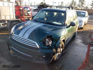 2013 MINI Cooper Clubman with VIN WMWZF3C57DT489934, listed as a IAAI auction lot 41290072 with 109,337 mi miles. Bid and sale history available at carsss.com. Image 2.