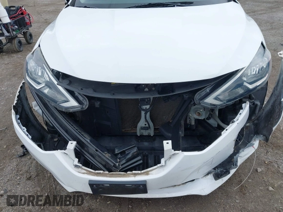 2017 Nissan Sentra S z VIN 3N1AB7AP7HY409457, wystawiony jako IAAI lot #42388313 z przebiegiem 126 553 mil mil oraz . Historia ofert i sprzedaży dostępna na DreamBid. Obrazek 12.