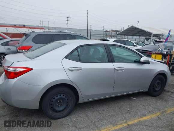2015 Toyota Corolla L with VIN 5YFBURHE6FP259379, listed as a IAAI auction lot 42153082 with 185,294 mi miles and . Bid and sale history available at DreamBid. Image 13.