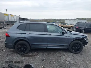 2022 Volkswagen Tiguan SE R-Line Black z VIN 3VVCB7AX9NM014741, wystawiony jako IAAI lot #42043123 z przebiegiem 71 777 mil mil oraz . Historia ofert i sprzedaży dostępna na DreamBid. Obrazek 14.