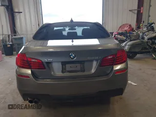 2014 BMW 5 Series 528i xDrive with VIN WBA5A7C5XED613856, listed as a IAAI auction lot 42018901 with 121,783 mi miles and . Bid and sale history available at DreamBid. Image 16.