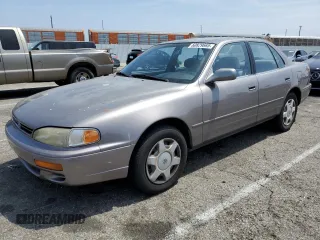 1995 Toyota Camry LE z VIN JT2GK12E0S0083092, wystawiony jako Copart lot #60829665 z przebiegiem 81 504 mil mil oraz Czysty tytuł • Clean title. Historia ofert i sprzedaży dostępna na DreamBid. Obrazek 1.