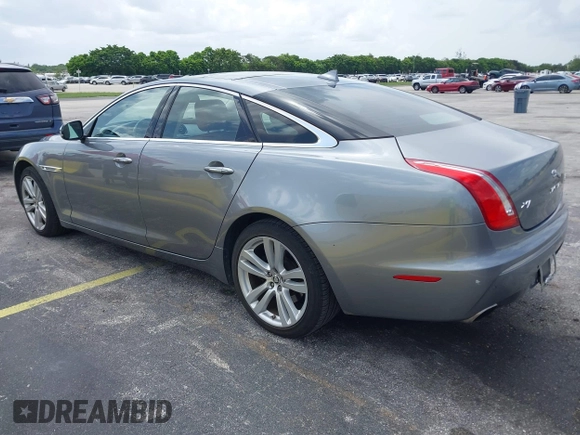 2013 Jaguar XJ with VIN SAJWJ1CD4D8V46305, listed as a IAAI auction lot 42637329 with 101,532 mi miles and . Bid and sale history available at DreamBid. Image 3.