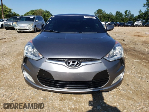 2016 Hyundai Veloster with VIN KMHTC6AD7GU248608, listed as a Copart auction lot 65809693 with 104,784 mi miles. Bid and sale history available at carsss.com. Image 5.