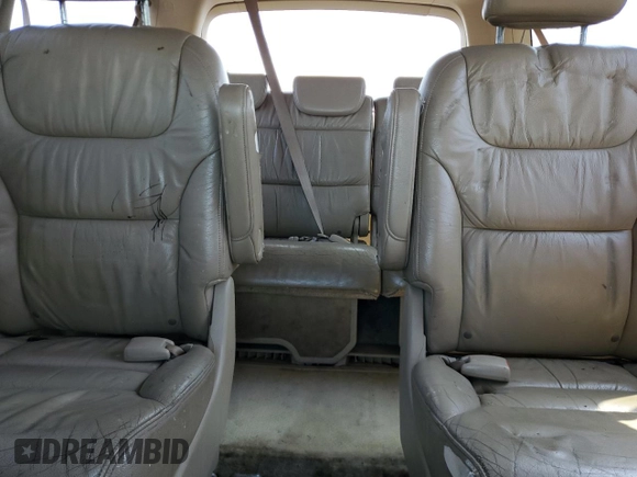 2006 Honda Odyssey EX-L z VIN 5FNRL38726B425098, wystawiony jako Copart lot #56143585 z przebiegiem 153 137 mil mil oraz Szkoda całkowita • Salvage title. Historia ofert i sprzedaży dostępna na DreamBid. Obrazek 10.