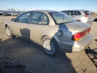 1999 Saturn SL with VIN 1G8ZK5270XZ147170, listed as a Copart auction lot 42169385 with 141,100 mi miles and Clean title. Bid and sale history available at DreamBid. Image 2.