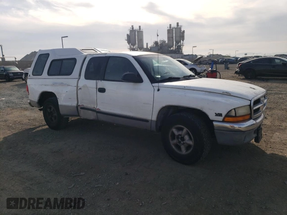1997 Dodge Dakota z VIN 1B7GL23X0VS124517, wystawiony jako Copart lot #82896894 z przebiegiem 227 782 mil mil oraz Szkoda całkowita • Salvage title. Historia ofert i sprzedaży dostępna na DreamBid. Obrazek 4.