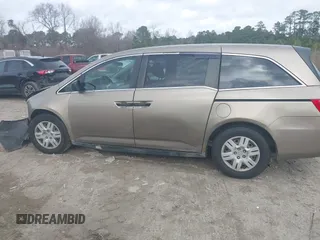 2012 Honda Odyssey LX z VIN 5FNRL5H25CB019912, wystawiony jako IAAI lot #41458224 z przebiegiem 158 980 mil mil oraz . Historia ofert i sprzedaży dostępna na DreamBid. Obrazek 15.