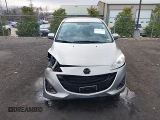 2012 Mazda 5 Sport with VIN JM1CW2BLXC0107933, listed as a IAAI auction lot 41813231 with 164,395 mi miles and . Bid and sale history available at DreamBid. Image 13.