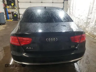 2011 Audi A8 z VIN WAURVAFD7BN006275, wystawiony jako Copart lot #58306205 z przebiegiem 190 383 mil mil oraz Szkody całkowita. Historia ofert i sprzedaży dostępna na DreamBid. Obrazek 6.