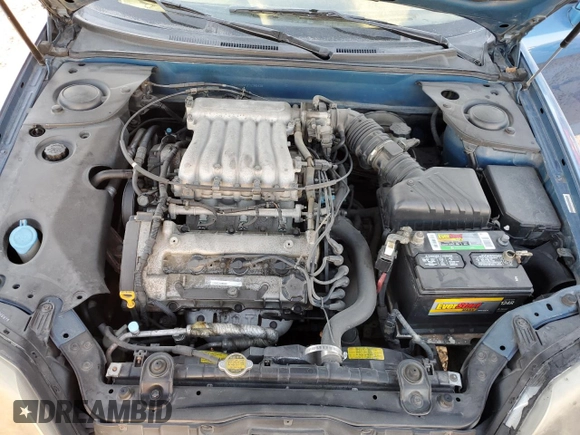 2005 Hyundai Tiburon GT z VIN KMHHN65F35U186438, wystawiony jako Copart lot #41879955 z przebiegiem 152 574 mil mil oraz Szkoda całkowita • Salvage title. Historia ofert i sprzedaży dostępna na DreamBid. Obrazek 11.