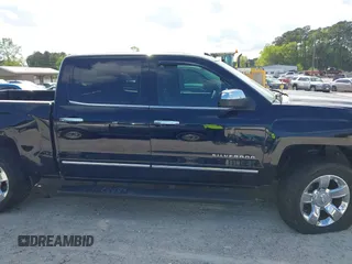 2015 Chevrolet Silverado 1500 LTZ with VIN 3GCUKSEC7FG145504, listed as a IAAI auction lot 41999825 with 206,560 mi miles and . Bid and sale history available at DreamBid. Image 13.