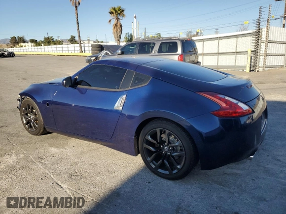 2017 Nissan 370Z z VIN JN1AZ4EH6HM952086, wystawiony jako Copart lot #88158105 z przebiegiem Nie podano mil oraz Szkoda całkowita • Salvage title. Historia ofert i sprzedaży dostępna na DreamBid. Obrazek 2.