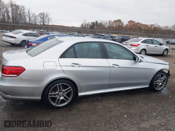 2014 Mercedes-Benz E 350 Luxury with VIN WDDHF8JB0EB075945, listed as a IAAI auction lot 41018546 with 66,678 mi miles and . Bid and sale history available at DreamBid. Image 14.