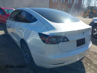 2020 Tesla Model 3 Long Range with VIN 5YJ3E1EBXLF636963, listed as a IAAI auction lot 41826249 with 68,085 mi miles. Bid and sale history available at carsss.com. Image 3.