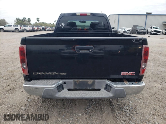 2005 GMC Canyon SLE Z71 with VIN 1GTDS196X58242957, listed as a Copart auction lot 87728635 with 206,977 mi miles and Salvage Title. Bid and sale history available at carsss.com. Image 6.