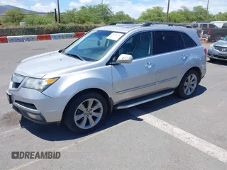 2013 Acura MDX Advance with VIN 2HNYD2H68DH507400, listed as a IAAI auction lot 42561721 with 127,985 mi miles and . Bid and sale history available at DreamBid. Image 2.