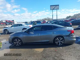 2016 Nissan Maxima Platinum with VIN 1N4AA6AP7GC409949, listed as a IAAI auction lot 41214746 with 190,853 mi miles and . Bid and sale history available at DreamBid. Image 14.