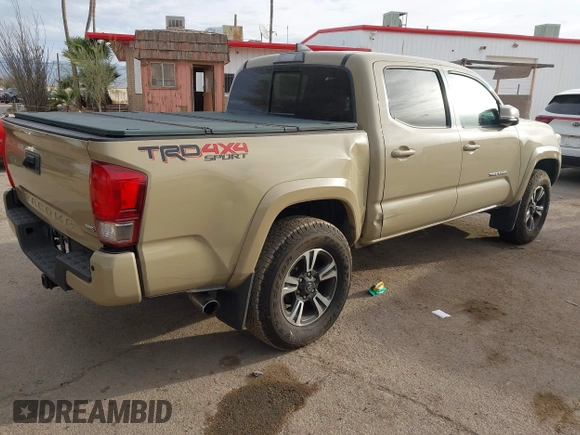 2017 Toyota Tacoma SR5 with VIN 3TMCZ5AN2HM063328, listed as a IAAI auction lot 41541775 with 137,610 mi miles and . Bid and sale history available at DreamBid. Image 4.