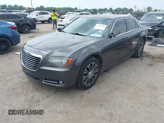 2014 Chrysler 300 S with VIN 2C3CCAGG5EH201509, listed as a IAAI auction lot 42292680 with 162,674 mi miles and . Bid and sale history available at DreamBid. Image 17.