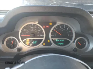 2010 Jeep Wrangler Rubicon with VIN 1J4BA6D10AL203265, listed as a Copart auction lot 79570754 with 114,840 mi miles and Salvage title. Bid and sale history available at DreamBid. Image 9.
