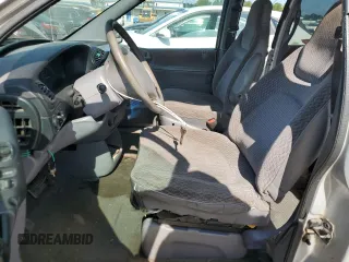 2000 Dodge Caravan SE with VIN 2B4GP45G0YR525310, listed as a Copart auction lot 69596394 with 299,957 mi miles and Salvage Title. Bid and sale history available at carsss.com. Image 7.