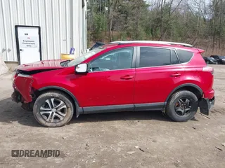 2016 Toyota RAV4 LE with VIN 2T3BFREV7GW517043, listed as a IAAI auction lot 41828999 with 103,587 mi miles. Bid and sale history available at carsss.com. Image 15.