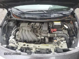 2015 Nissan Versa SV with VIN 3N1CN7AP6FL803252, listed as a Copart auction lot 61076555 with 84,161 mi miles and Salvage title. Bid and sale history available at DreamBid. Image 11.