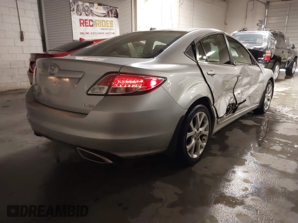 2010 Mazda 6 S Grand Touring with VIN 1YVHZ8CB4A5M08651, listed as a IAAI auction lot 41325049 with 144,834 mi miles and . Bid and sale history available at DreamBid. Image 4.