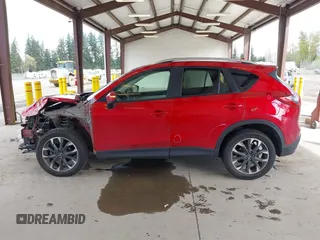 2016 Mazda CX-5 Grand Touring with VIN JM3KE4DY3G0688062, listed as a IAAI auction lot 42025169 with 59,867 mi miles and . Bid and sale history available at carsss.com. Image 15.