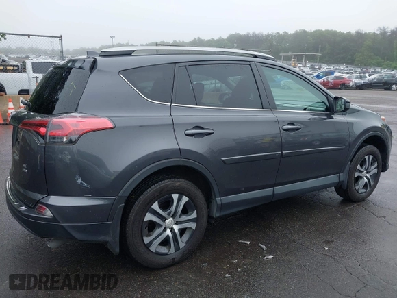 2018 Toyota RAV4 LE with VIN 2T3BFREV8JW850391, listed as a IAAI auction lot 42487413 with 66,866 mi miles and . Bid and sale history available at DreamBid. Image 4.