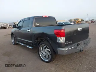 2013 Toyota Tundra Limited with VIN 5TFFY5F19DX137337, listed as a IAAI auction lot 41848771 with 182,886 mi miles and . Bid and sale history available at DreamBid. Image 3.