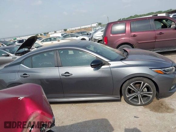 2021 Nissan Sentra SR z VIN 3N1AB8DV6MY219756, wystawiony jako IAAI lot #42257180 z przebiegiem 55 867 mil mil oraz . Historia ofert i sprzedaży dostępna na DreamBid. Obrazek 13.