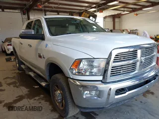 2012 Ram 2500 Laramie with VIN 3C6UD5NL9CG177692, listed as a IAAI auction lot 42442250 with 106,047 mi miles and . Bid and sale history available at DreamBid. Image 1.